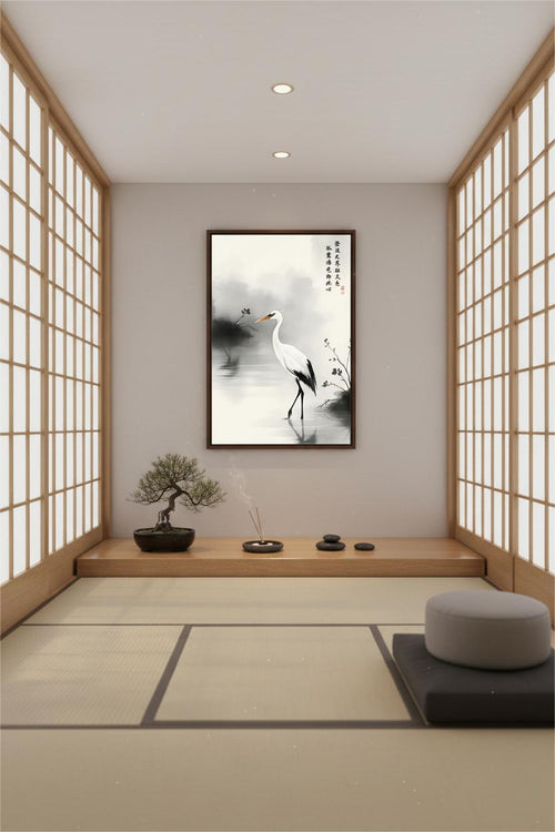 The Lone Egret upon Clear Waters ink painting in a black frame above a low wooden platform in a meditation room.