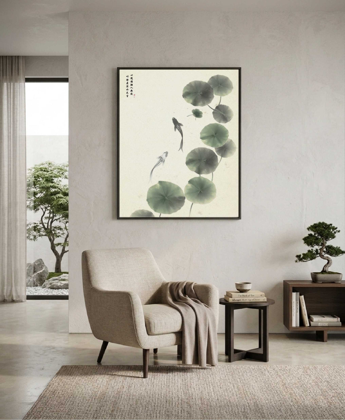 The Heart Observing in Still Waters ink painting in a black frame above an armchair in a minimalist reading area.