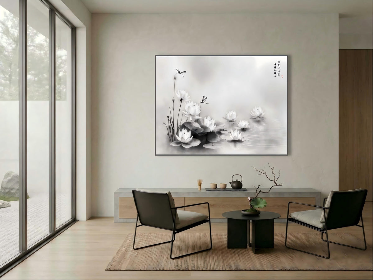 Lotus Grace Clear Light ink painting in a white frame above a low sideboard in a modern minimalist interior.
